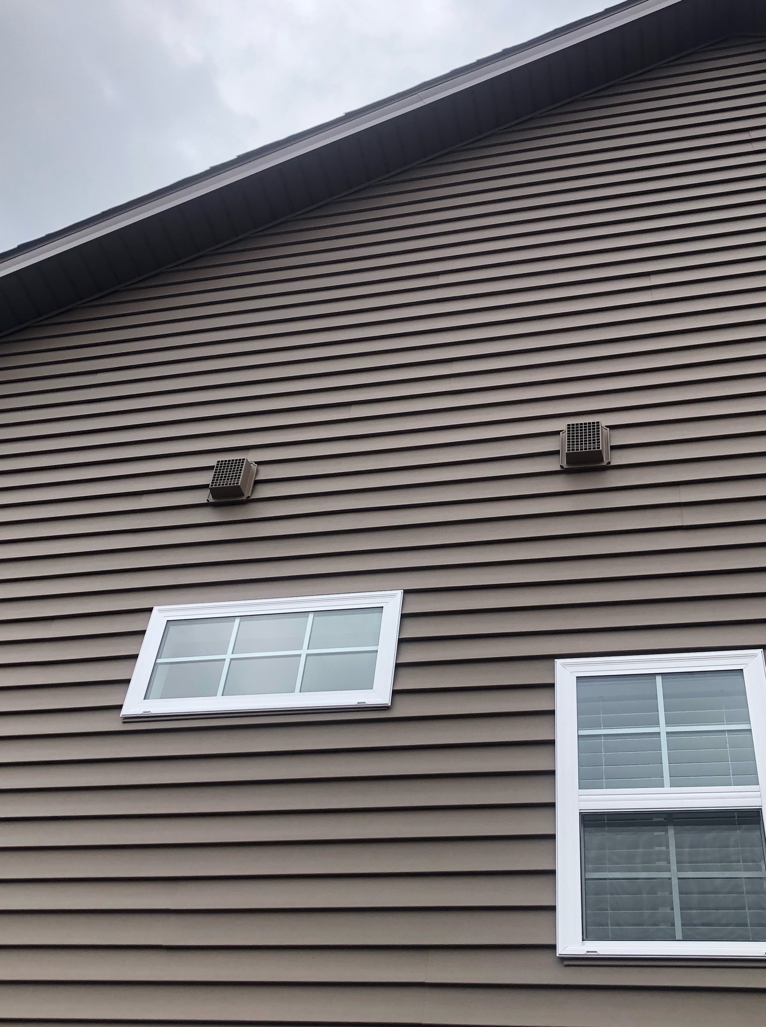 ventcoversthatpreventbirdsfromnestinginsiding Carlson Exteriors Inc.
